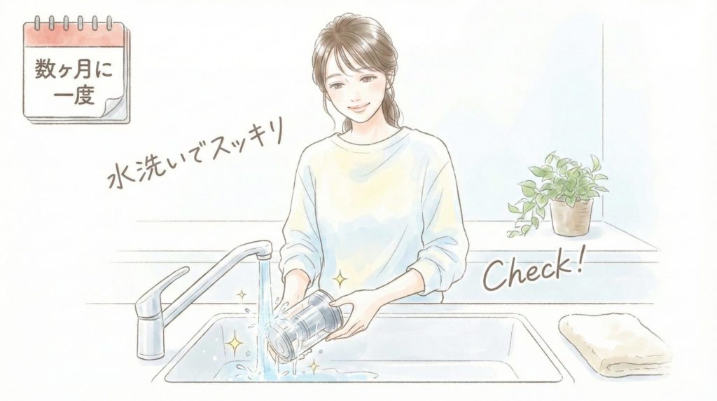 MC-NX500Kのダストカップを数ヶ月に一度水洗いをしている主婦のイメージ